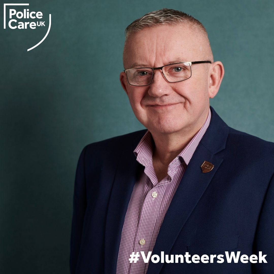 Police Care UK Trustee Steve Wilcock smiles for the camera for a portrait
